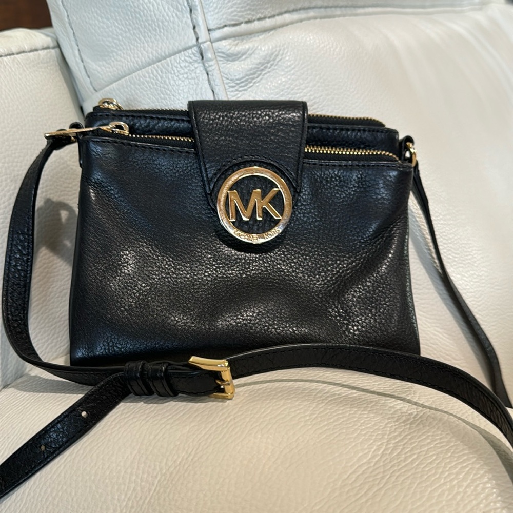 Authentic Leather Michael Kors crossbody bag.